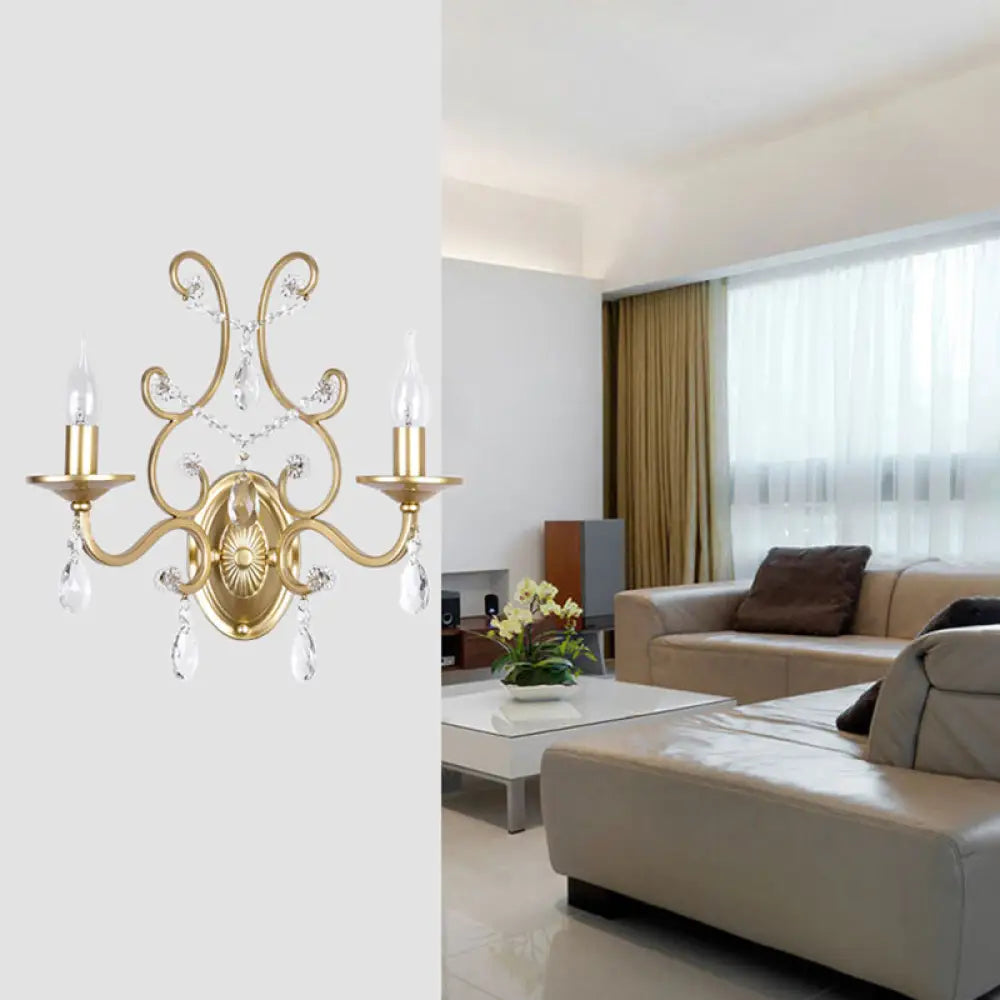 DecorBites™ DecorBites™ Contemporary Crystal Wall Sconce with Curved Arm and Brass Finish