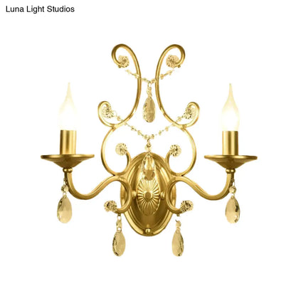 DecorBites™ DecorBites™ Contemporary Crystal Wall Sconce with Curved Arm and Brass Finish