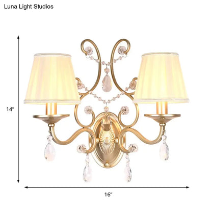 DecorBites™ DecorBites™ Contemporary Crystal Wall Sconce with Curved Arm and Brass Finish