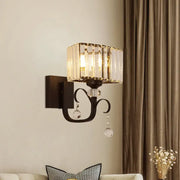 Contemporary dark bronze metal wall sconce with clear glass droplets as a crystal sconce light wall lamp