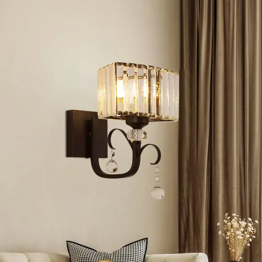 Contemporary dark bronze metal wall sconce with clear glass droplets as a crystal sconce light wall lamp