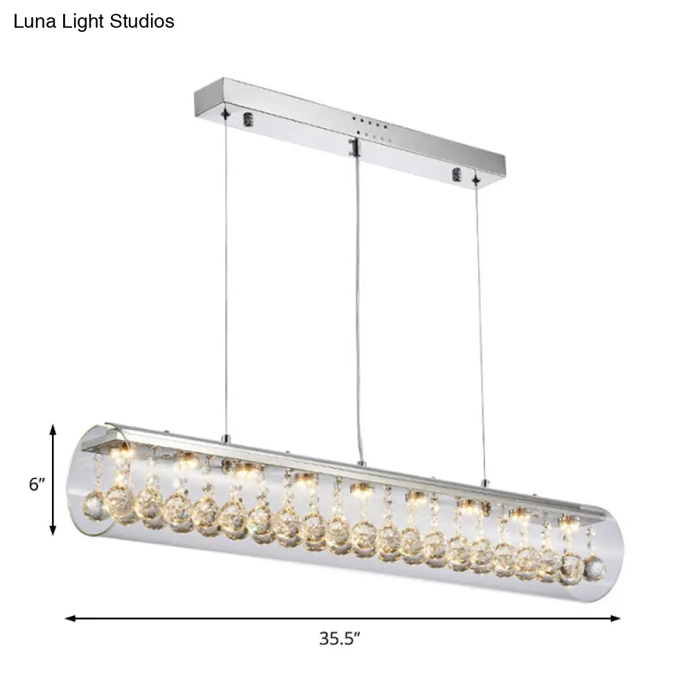 Lámpara colgante de isla DecorBites™ de cristal contemporáneo con 5 luces cilíndricas horizontales y detalle de bola de cristal.
