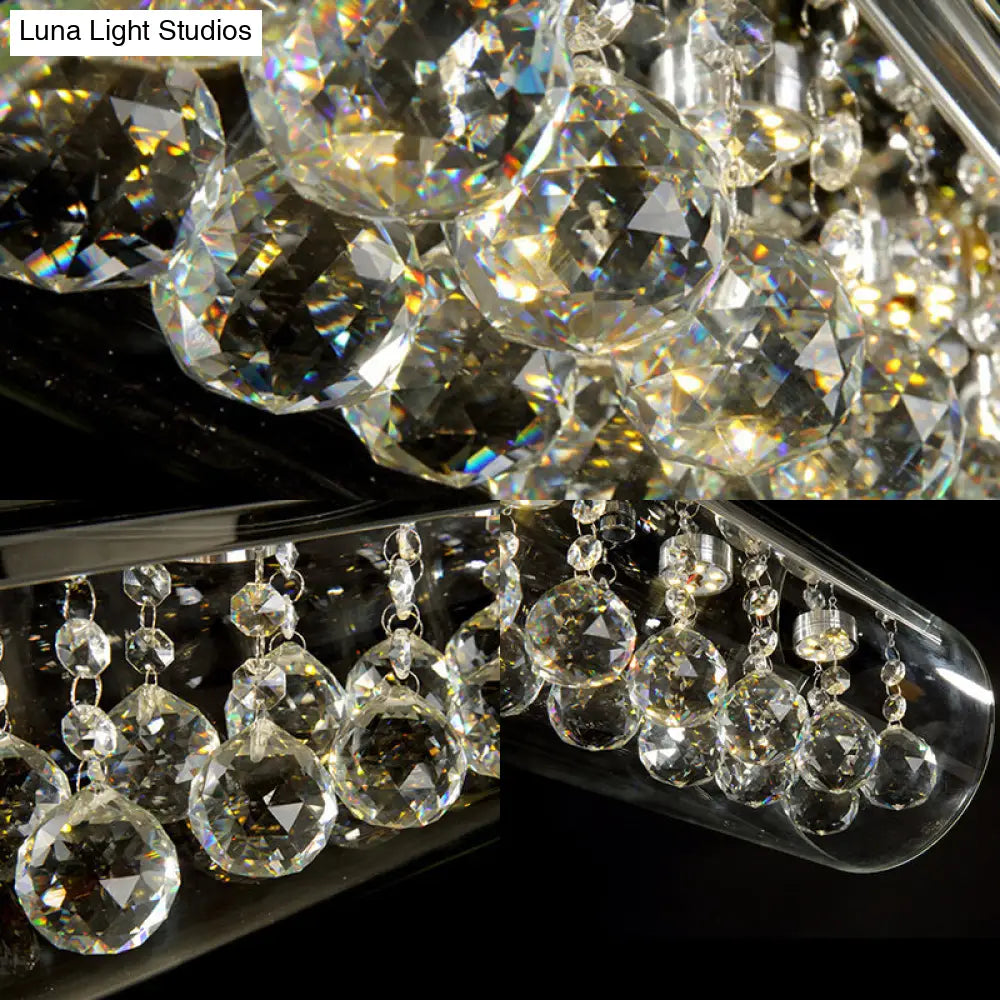 Lámpara colgante de isla DecorBites™ de cristal contemporáneo con 5 luces cilíndricas horizontales y detalle de bola de cristal.