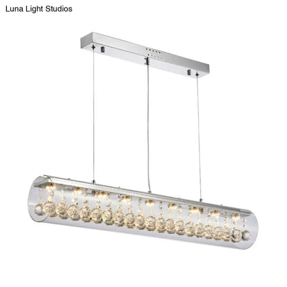 Lámpara colgante de isla DecorBites™ de cristal contemporáneo con 5 luces cilíndricas horizontales y detalle de bola de cristal.