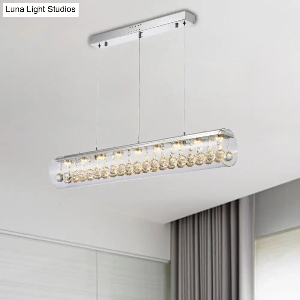Lámpara colgante de isla DecorBites™ de cristal contemporáneo con 5 luces cilíndricas horizontales y detalle de bola de cristal.