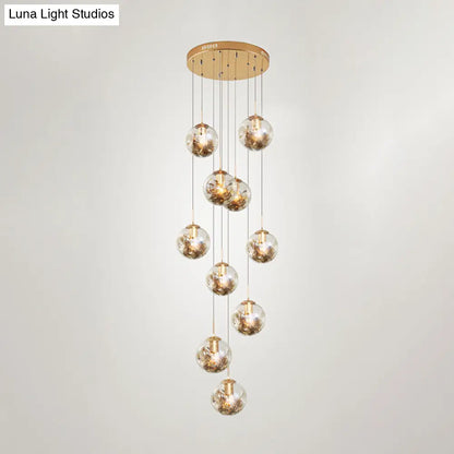 Contemporary Gold Ball Chandelier with Amber Dimpled Glass Pendant - 10 Bulbs, Multi-Light for Living Room