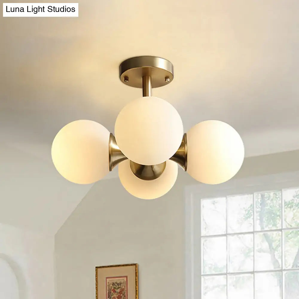 Contemporary Gold Ball Semi Flush Ceiling Light with 4 Milky Glass Heads