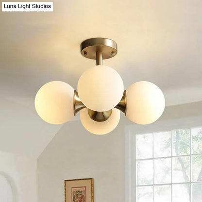 Contemporary Gold Ball Semi Flush Ceiling Light with 4 Milky Glass Heads