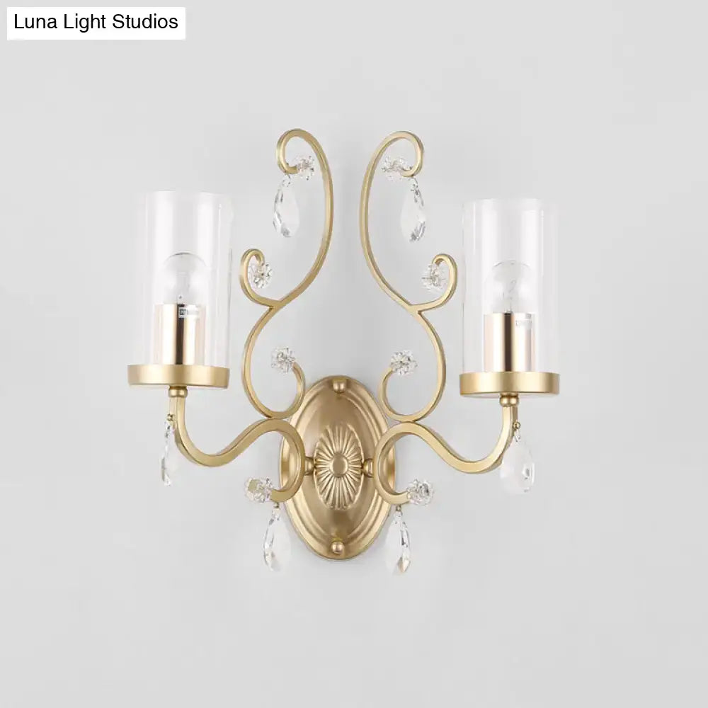 Contemporary gold clear glass wall light with ornate crystal droplets for elegant bedroom wall sconce lighting