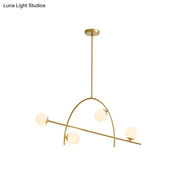 DecorBites™ chandelier lamp with five gold-toned arms and cream glass shade offering warm white lighting