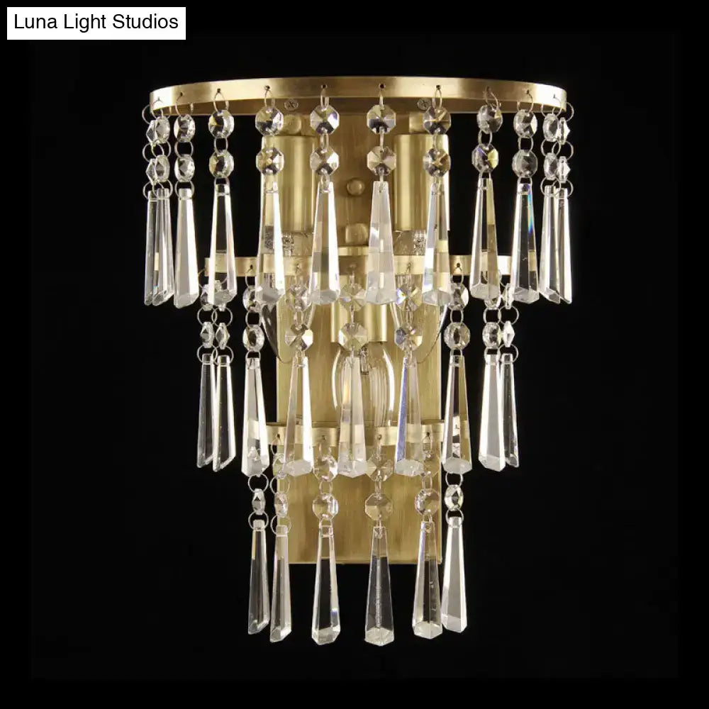 Contemporary gold crystal flute tiered wall sconce lighting with cascading clear glass prisms and spherical beads