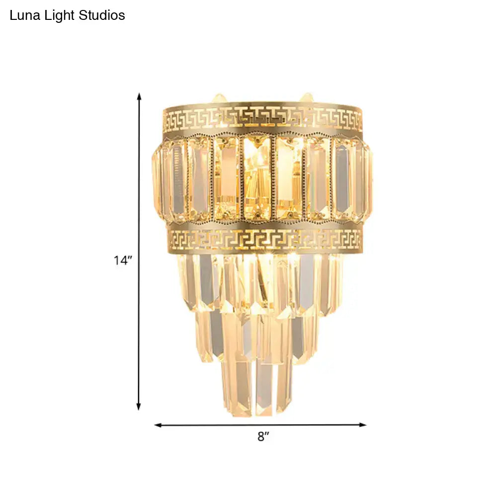 Contemporary gold wall lamp with greek key pattern and cascading crystal prisms 12 inch fixture for bedroom light