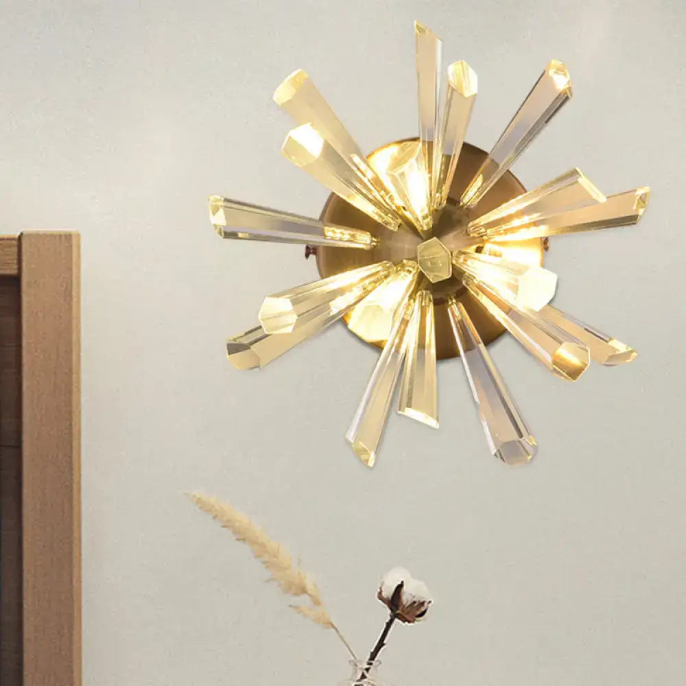 Contemporary gold crystal sputnik wall sconce with radiant faceted sunburst arms and standard bulb base inches tall