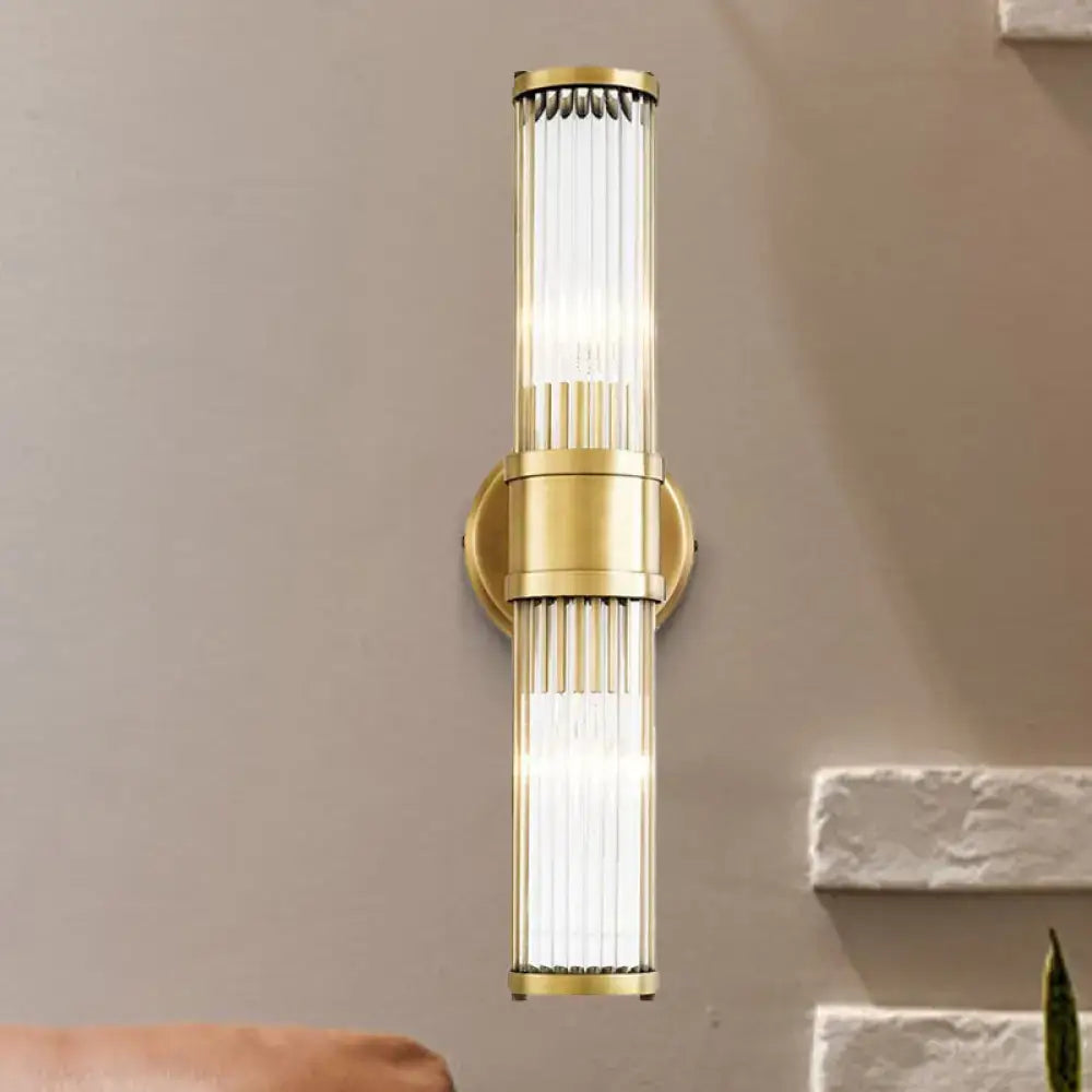 Contemporary gold crystal wall sconce light fixture with vertical glass rods for living room lighting decor