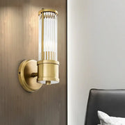 Contemporary gold crystal wall sconce light fixture with vertical crystal glass rods for living room lighting