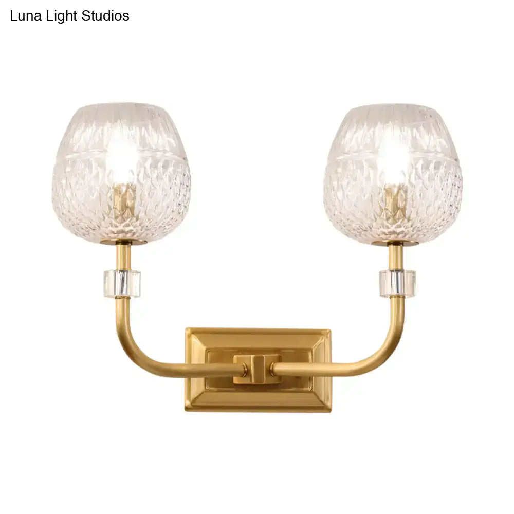 Contemporary gold dome foyer wall light with clear lattice glass and two textured clear glass globe shades