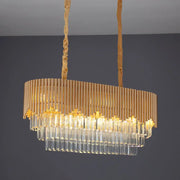 Decorbites™ contemporary gold finish chandelier with vertical brass rods and cascading clear crystal blocks
