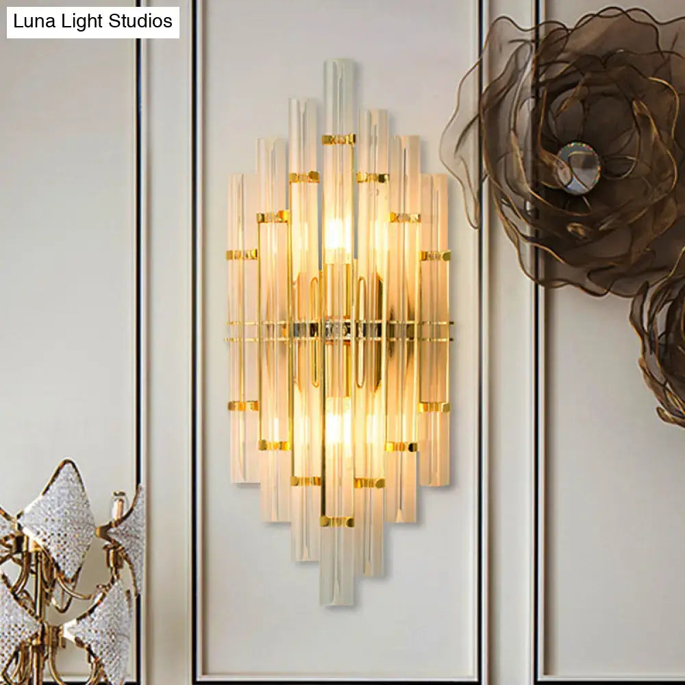 Contemporary gold finish crystal tube wall sconce with vertical frosted glass tubes and gold-toned metal accents