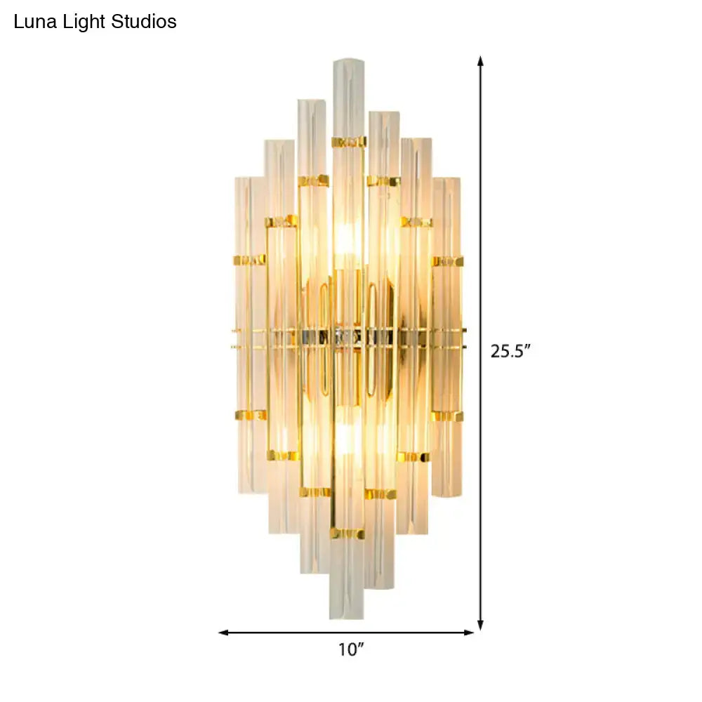 Contemporary gold finish crystal tube wall sconce with cascading translucent glass tubes ideal for bedroom lighting