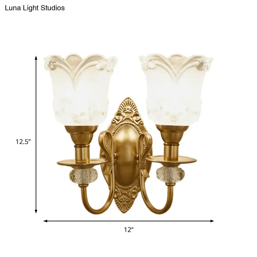 Contemporary gold antique brass wall lamp with frosted glass petal shades and crystal accents for bedroom use