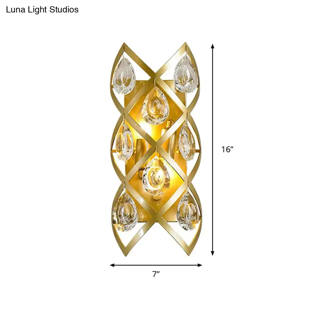 Contemporary gold geometric teardrop sconce with clear crystal accents for living room light fixture