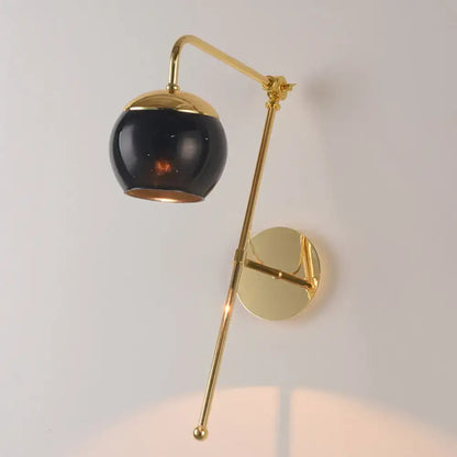 Contemporary gold gooseneck sconce light with black clear spherical glass shade wall mount lamp for bedroom
