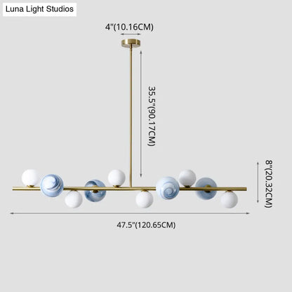 Lámpara colgante DecorBites™ contemporánea de metal dorado con esfera de cristal para mesa de comedor