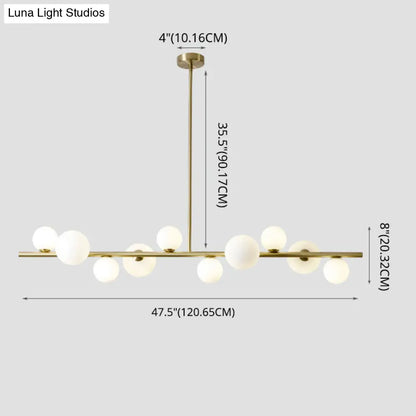 Lámpara colgante DecorBites™ contemporánea de metal dorado con esfera de cristal para mesa de comedor
