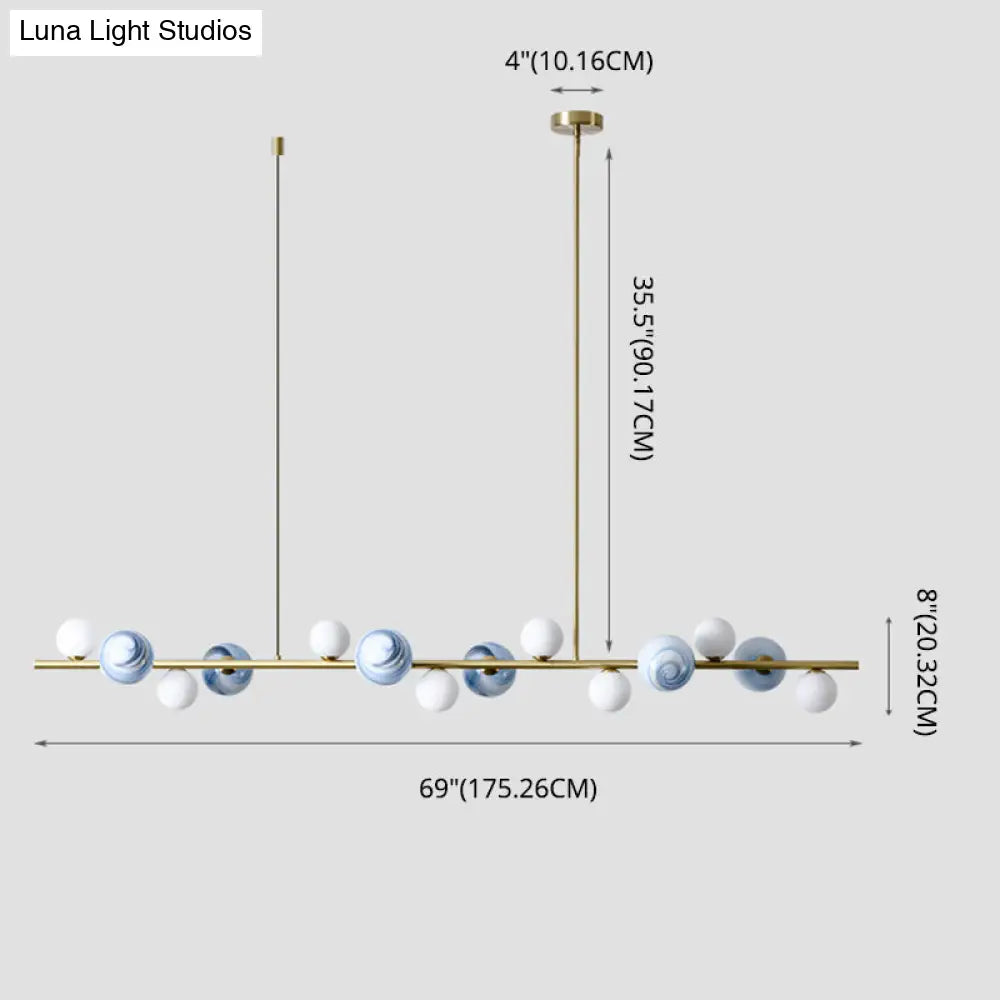 Lámpara colgante DecorBites™ contemporánea de metal dorado con esfera de cristal para mesa de comedor
