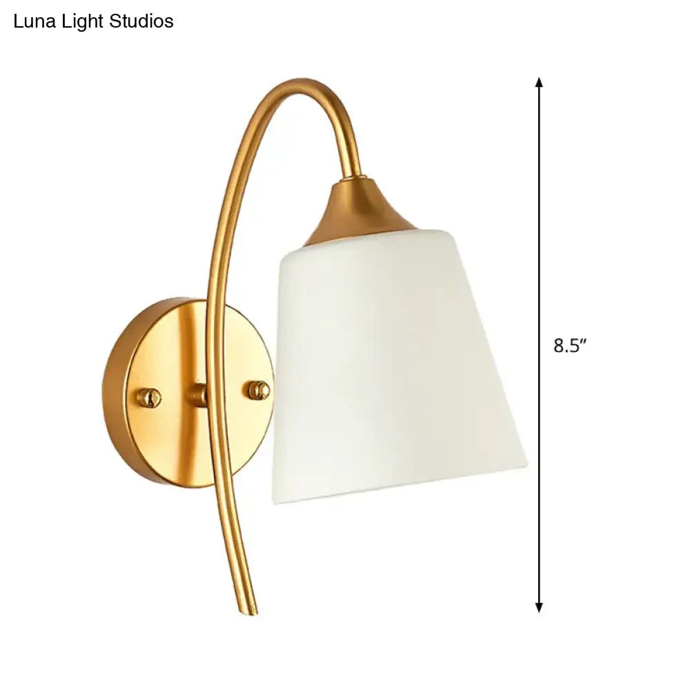 Contemporary gold milk glass wall lamp with gold finish and white frosted glass shade for bedroom sconce lighting