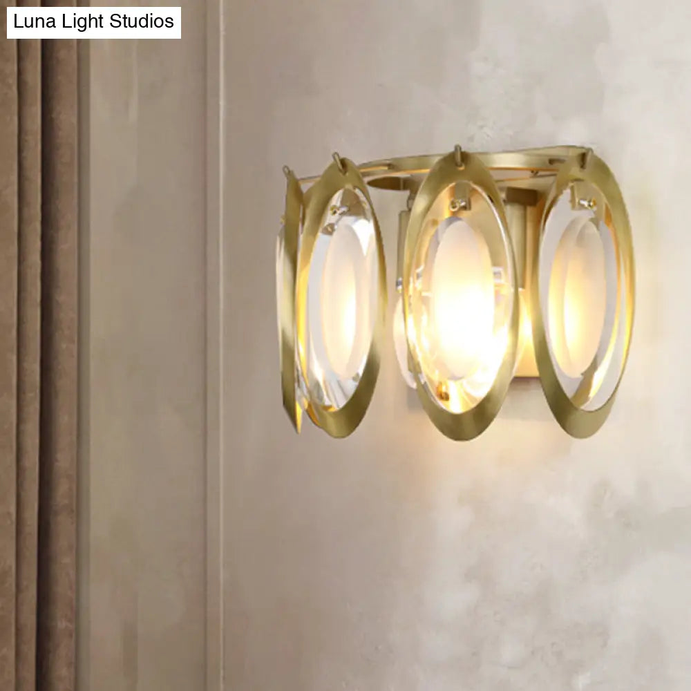 Aplique ovalado dorado contemporáneo DecorBites™ con detalle de cristal tallado: la lámpara de pared perfecta para la iluminación del salón.