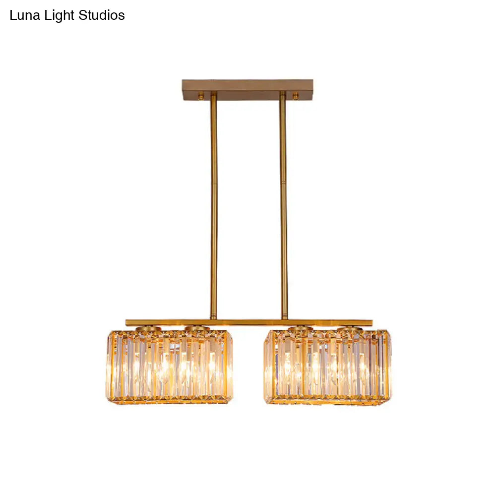 Lámpara colgante contemporánea dorada DecorBites™ para comedor: lámpara lineal metálica para isla con pantalla de cristal cuboide transparente