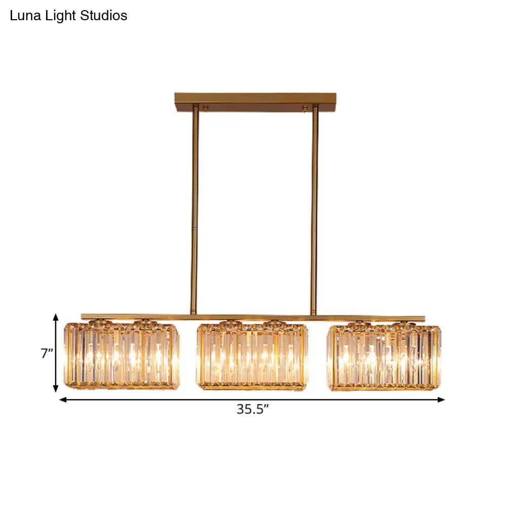 Lámpara colgante contemporánea dorada DecorBites™ para comedor: lámpara lineal metálica para isla con pantalla de cristal cuboide transparente