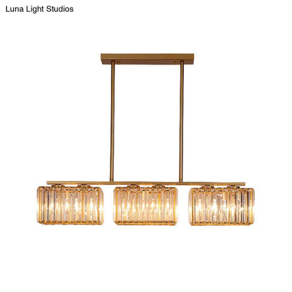 Lámpara colgante contemporánea dorada DecorBites™ para comedor: lámpara lineal metálica para isla con pantalla de cristal cuboide transparente