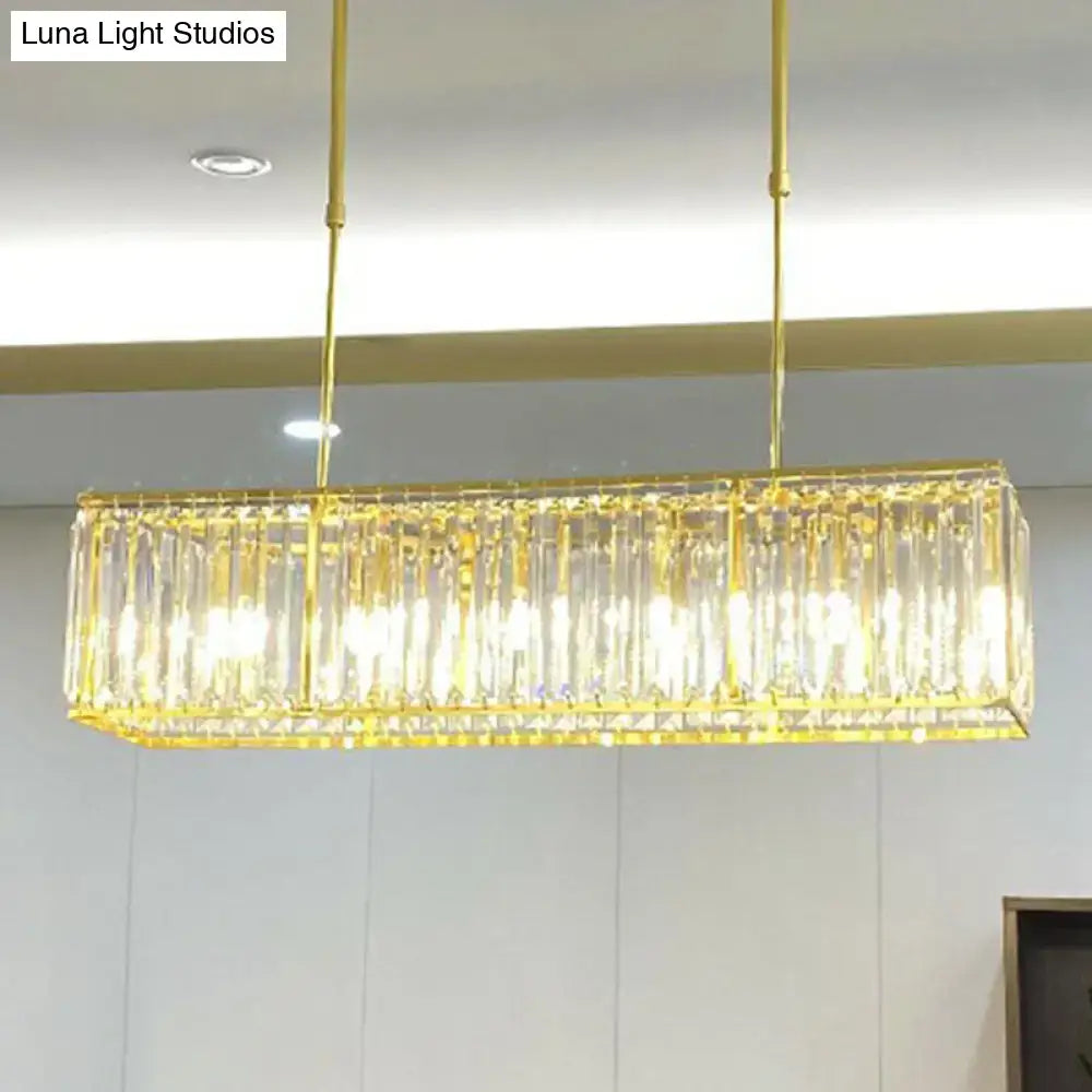 DecorBites contemporary gold rectangular island pendant light with vertical tri-prism crystal accents for dining room