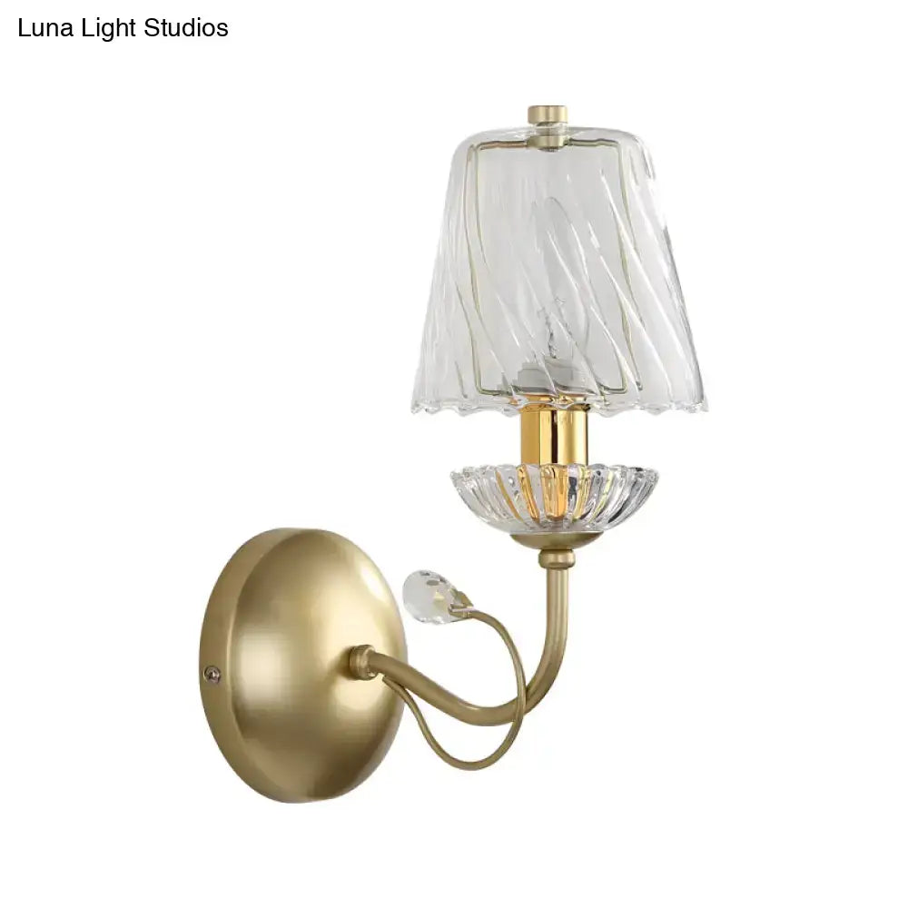 Antique brass wall light with twisted clear glass shade crystal accents and e12 bulb base for bedroom use