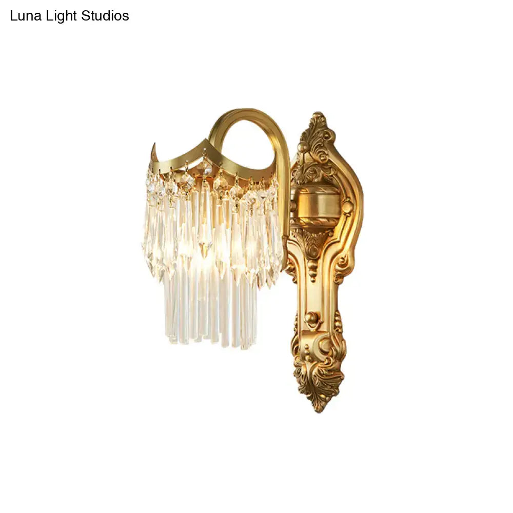 Contemporary gold wall lamp with clear crystal prism and cascading design suitable for corridor lighting with led or incandescent