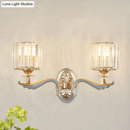 Aplique de pared contemporáneo DecorBites™ dorado con pantalla de cristal transparente - Lámpara cilíndrica modernista de media cabeza