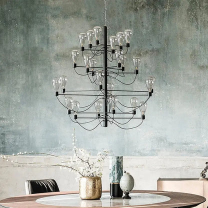 Contemporary iron glass chandelier with tiered clear glass bulbs in black metal ideal for foyer lighting by decorbites contemporary iron
