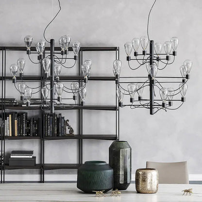 Black metal contemporary iron glass chandelier with multiple clear glass bulbs in a geometric branching foyer design