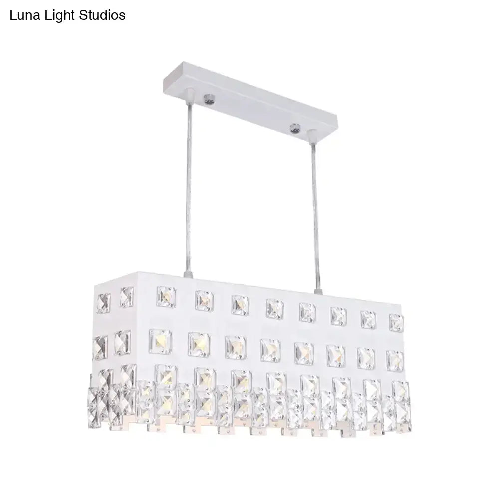 Contemporary ivory metal chandelier with white rectangular pendant and clear crystal accents for dining room