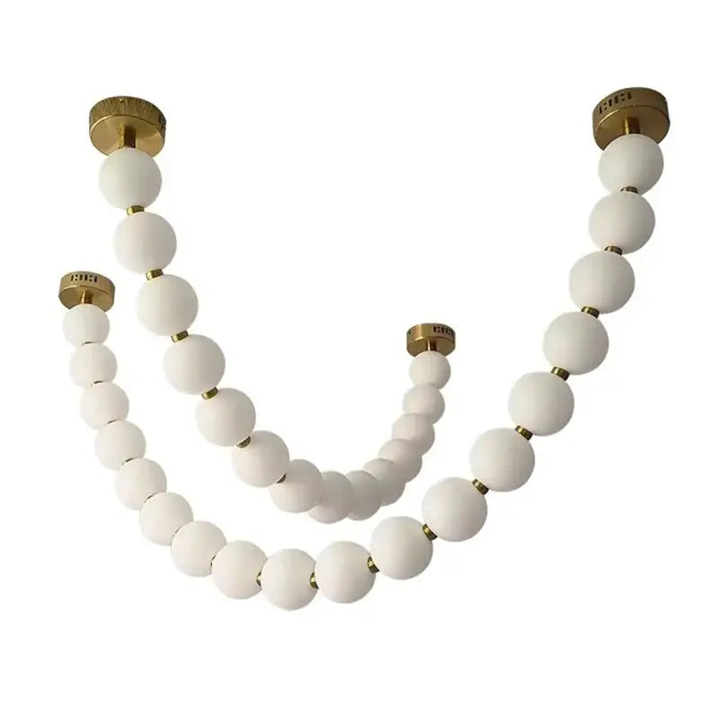 Contemporary led pendant chandelier featuring a white matte glass orb with gold-toned metal fixtures for dining room decorbites contemporary led