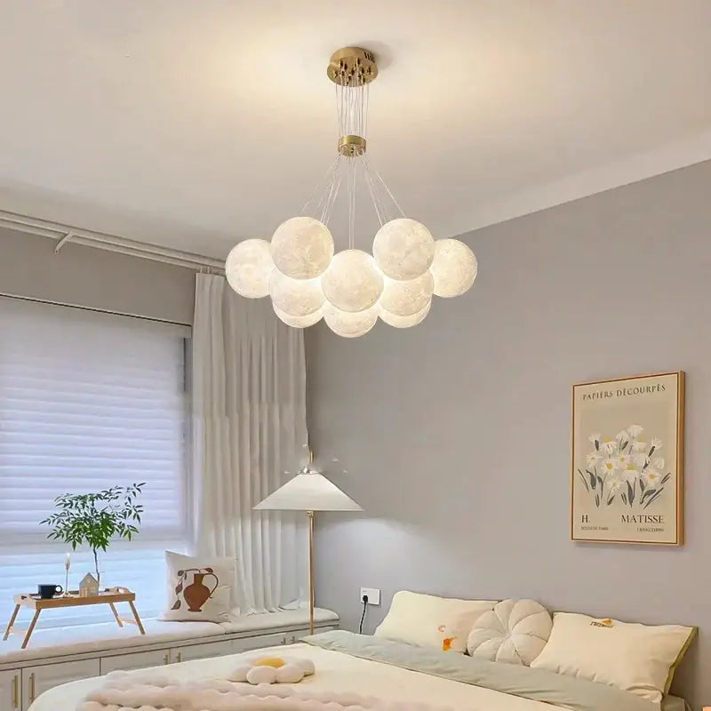 A modern gold moon chandelier with frosted glass orbs designed as contemporary led pendant lights for dining room decorbites contemporary led