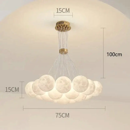 A modern decorbites contemporary led pendant light with gold metal frame and illuminated moon-shaped globes for dining room
