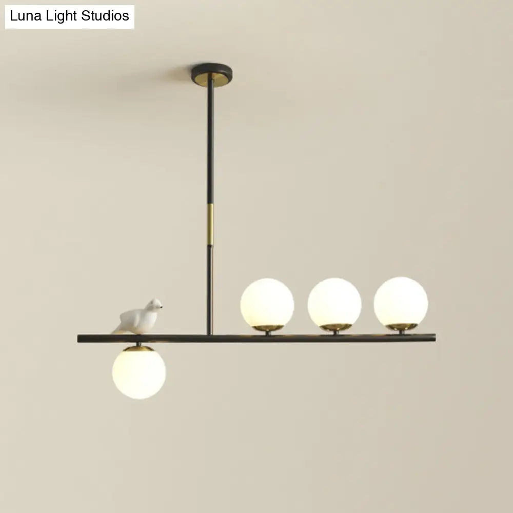 DecorBites™ Contemporary Linear/Branch Dining Room Island Lamp - Cream Glass Ball, 4 Heads, Hanging Pendant with Bird Deco (Black-Gold)
