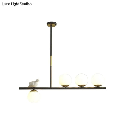 DecorBites™ Contemporary Linear/Branch Dining Room Island Lamp - Cream Glass Ball, 4 Heads, Hanging Pendant with Bird Deco (Black-Gold)