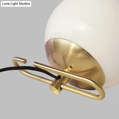 Contemporary Milky Glass Orbit Table Light with Metal Base - Perfect Bedside Wall Lamp