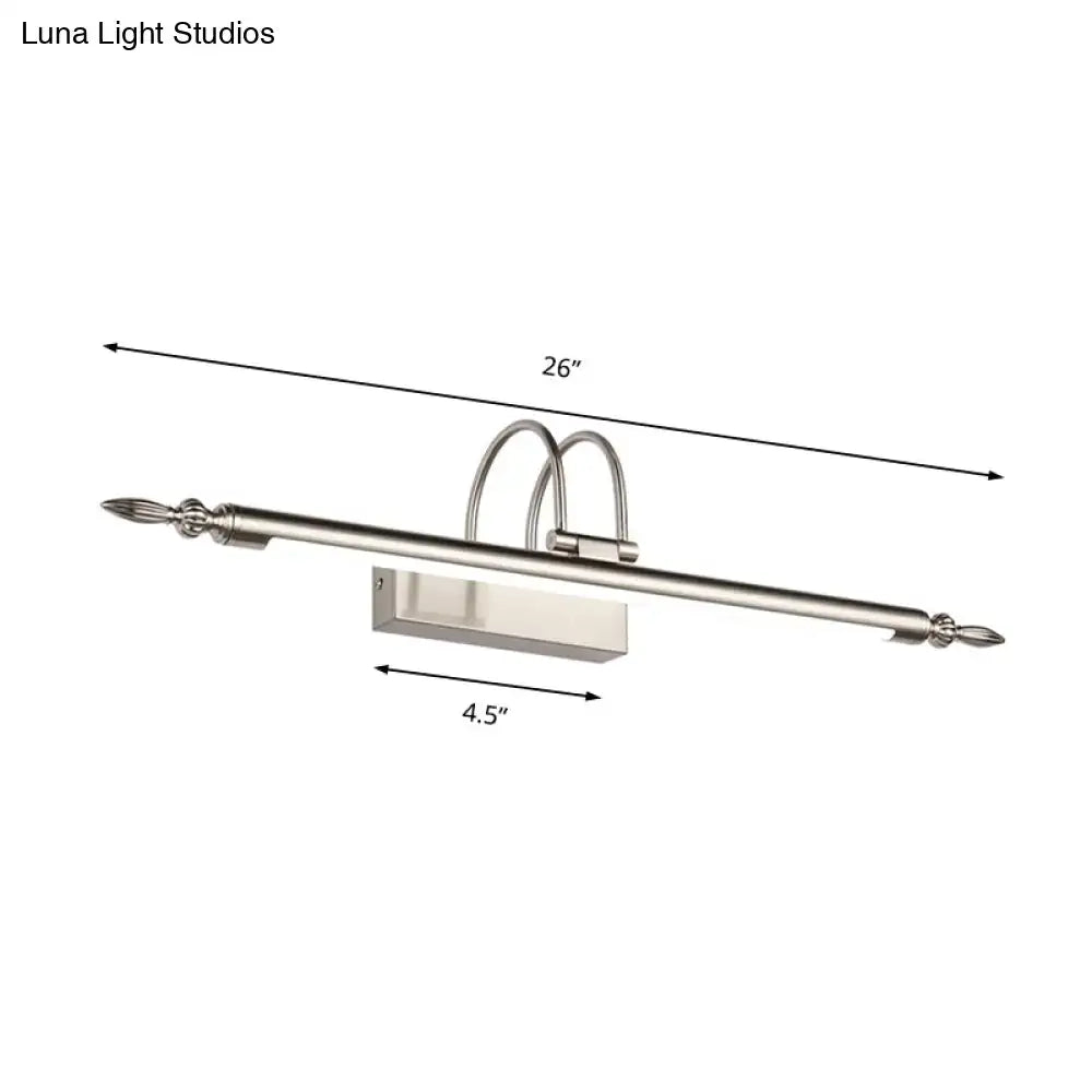 Contemporary nickel finish led wall sconce with silver curved arms and warm light for bedroom use
