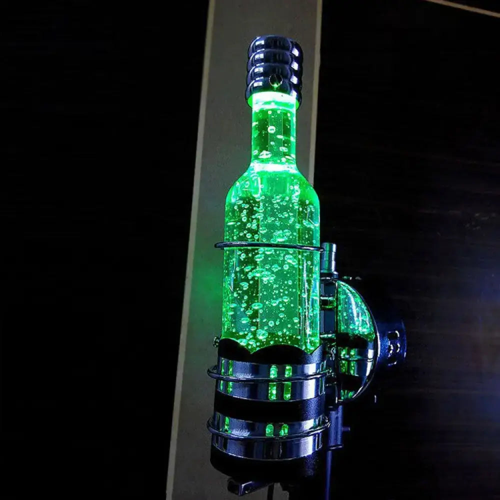 Contemporary purple crystal wall lamp featuring a glowing green liquid bottle with metallic cap in a chrome holder