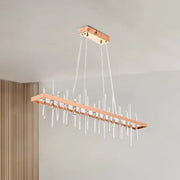 A modern rectangular contemporary rose gold led crystal rod chandelier with clear glass rods for dining room light decorbites